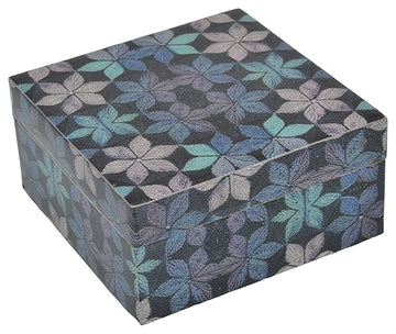 A multicolored wooden storage box with a geometric pattern on the lid.
