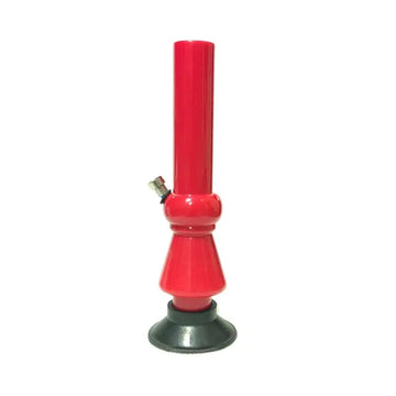 A red acrylic smoking waterpipe bong with a black base.