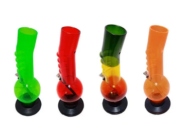 This image displays a collection of Moksha 12" Single Bulb Gripper Acrylic Bongs in a variety of vibrant colors. The acrylic bongs, presented in green, red, yellow, and orange, exhibit a glossy, high-quality polish that enhances their durable and lightweight construction.