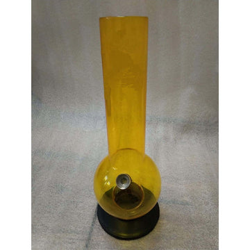 A transparent yellow acrylic water bong with a high gloss finish.