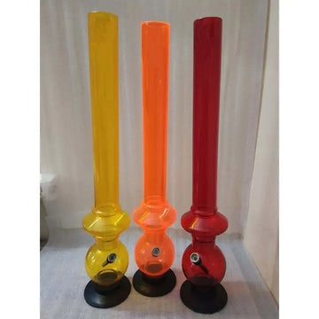 Three acrylic bongs in yellow, orange, and red colors, standing upright with a transparent disc base.