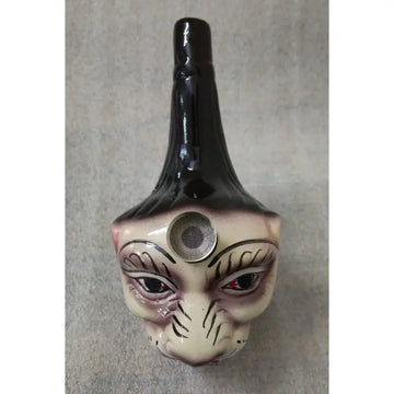 A 5 inch lion faced ceramic water bong with a high gloss finish.
