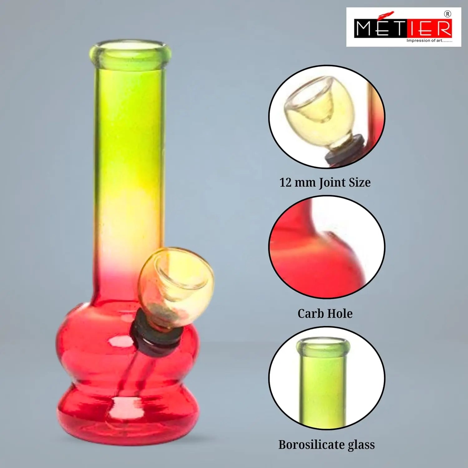 Glass smoking device with color gradient from green to red, featuring METIER branding.