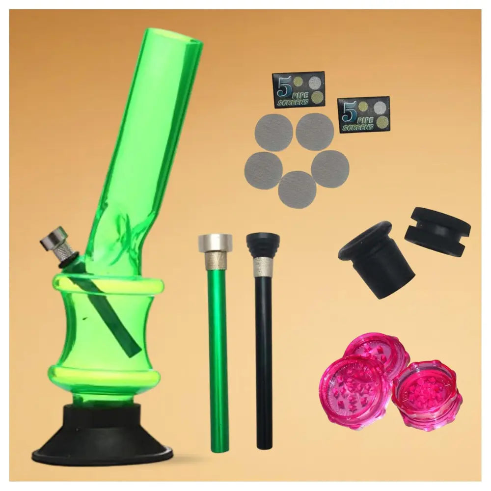 Green glass smoking accessory set with accessories on a beige background