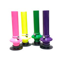A collection of four acrylic bongs in different colors: pink, yellow, green, and purple, each with a base for stability.