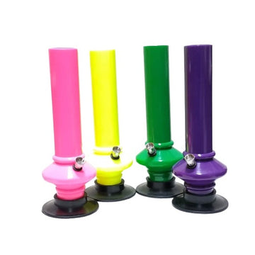 A collection of four acrylic bongs in different colors: pink, yellow, green, and purple, each with a base for stability.