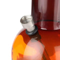 Close-up of an orange acrylic bong hookah with a metal filter tip attached to the top.