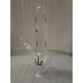 A 12 inch clear glass water bong with leaf print designs along its body.
