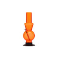 An orange acrylic ice water bong with a globe-like base and a narrow top tube, featuring a downstem and a small hole for smoking.