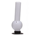 A 12 inch tall white large bulb acrylic water bong with a round base and a narrow top.