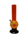 A transparent red acrylic water bong with a single bulb design on the base, standing upright.