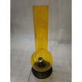A transparent yellow acrylic water bong with a high gloss finish.