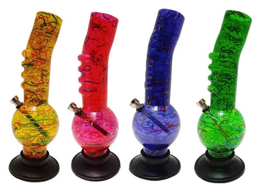 A set of four colorful acrylic bongs with a marble-like pattern, each in different colors: yellow, red, blue, and green. They all have a single bulbous shape and are displayed on a stand.
