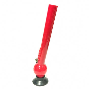 A red acrylic bong with a single bulb and a grip, standing upright on a black base.