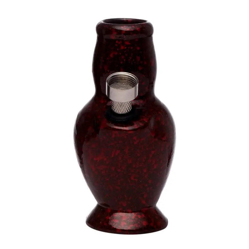 A 4 inch tall red ceramic water bong with a speckled pattern.