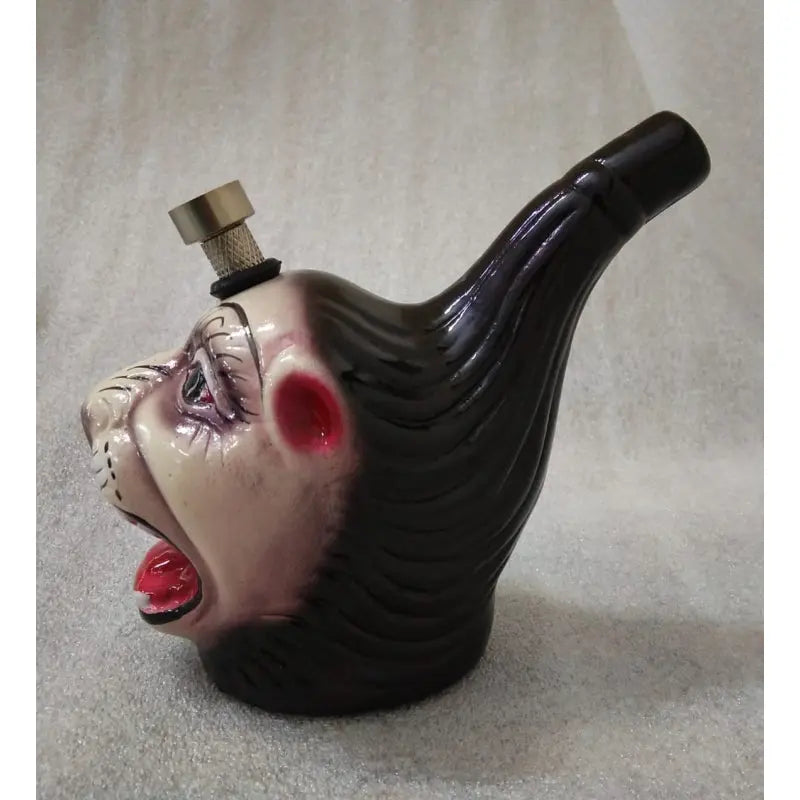 A 5 inch lion faced ceramic water bong with a high gloss finish.