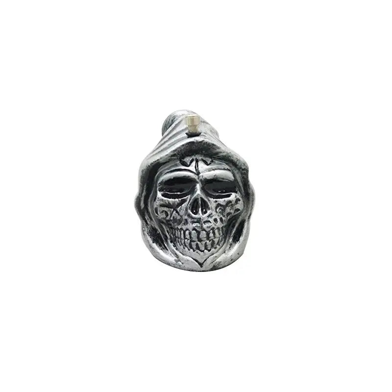 Skull-shaped object with a hood on a dark background
